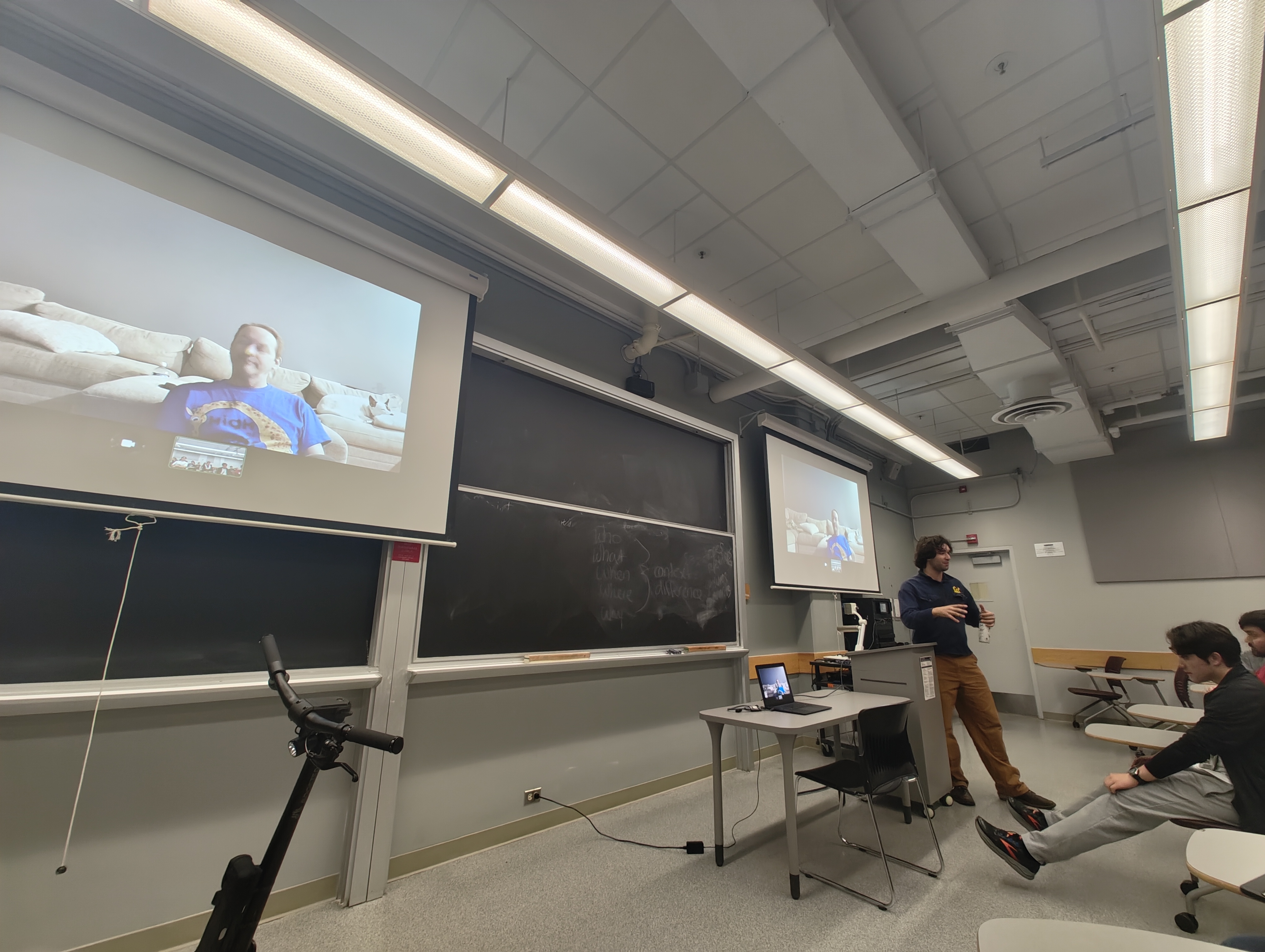Chris Boden on the projector screens
